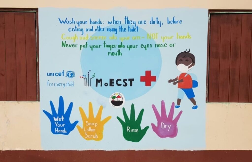 As school restarts, Ministries of Health & Education, Red Cross painting murals at primary schools countrywide to remind students of importance of handwashing
